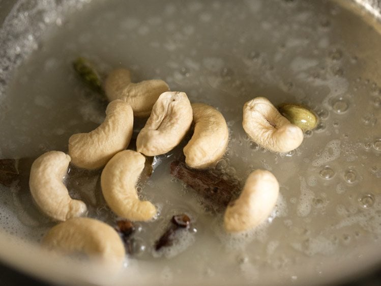 cashews added to pan. 