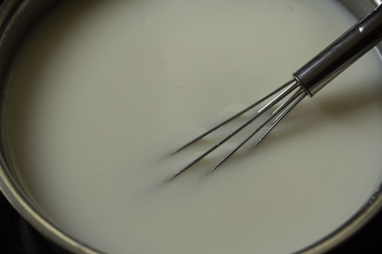 water mixed well with the curd into a even mixture to make majjiga charu.