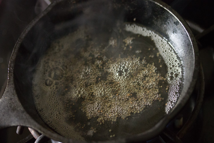 mustard seeds crackling in hot oil. 