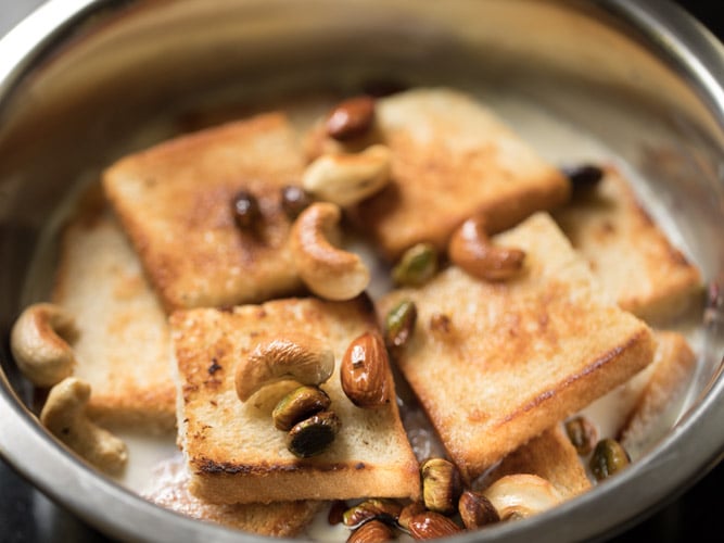 pan fried dry fruits added on the bread layers. 