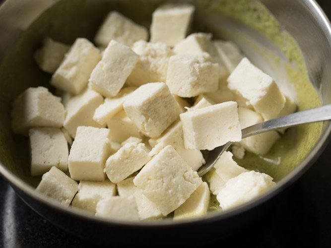 paneer cubes added to prepared marinade. 