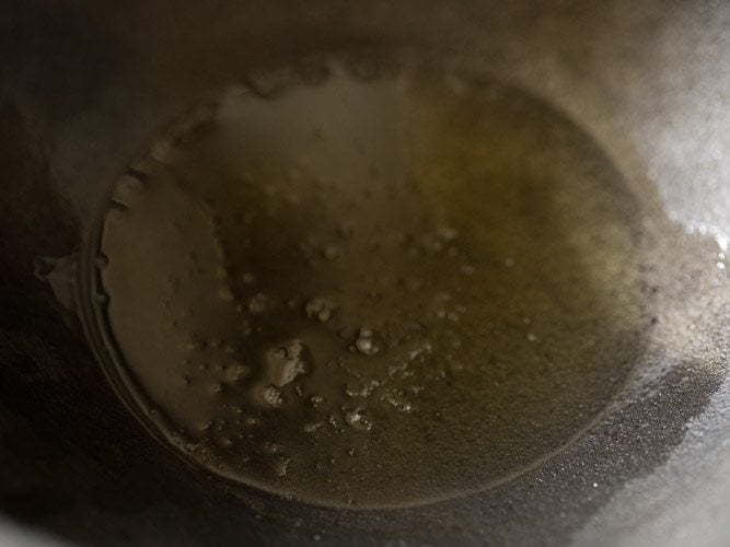 heating oil in heavy pan