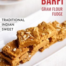 besan ki barfi pieces stacked on top of one another and served on a rectangular white platter with text layovers.