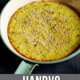 handvo served in a pan with text layover.