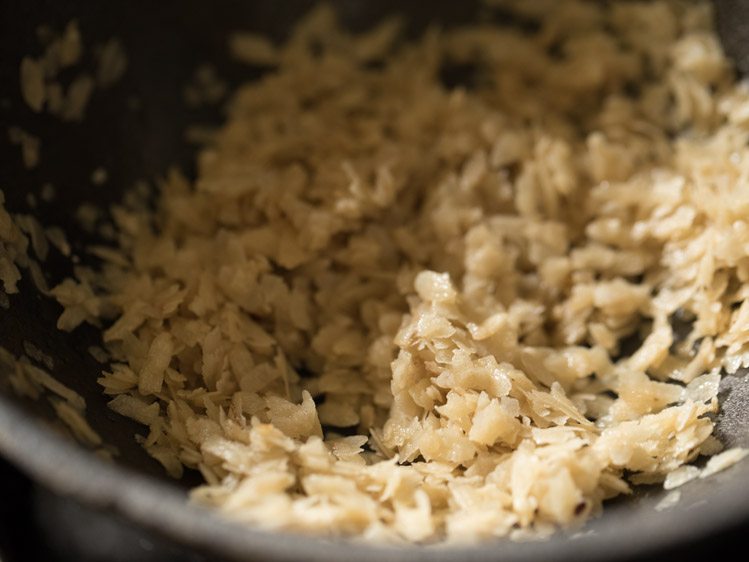 roasting poha on low heat for aval payasam recipe. 