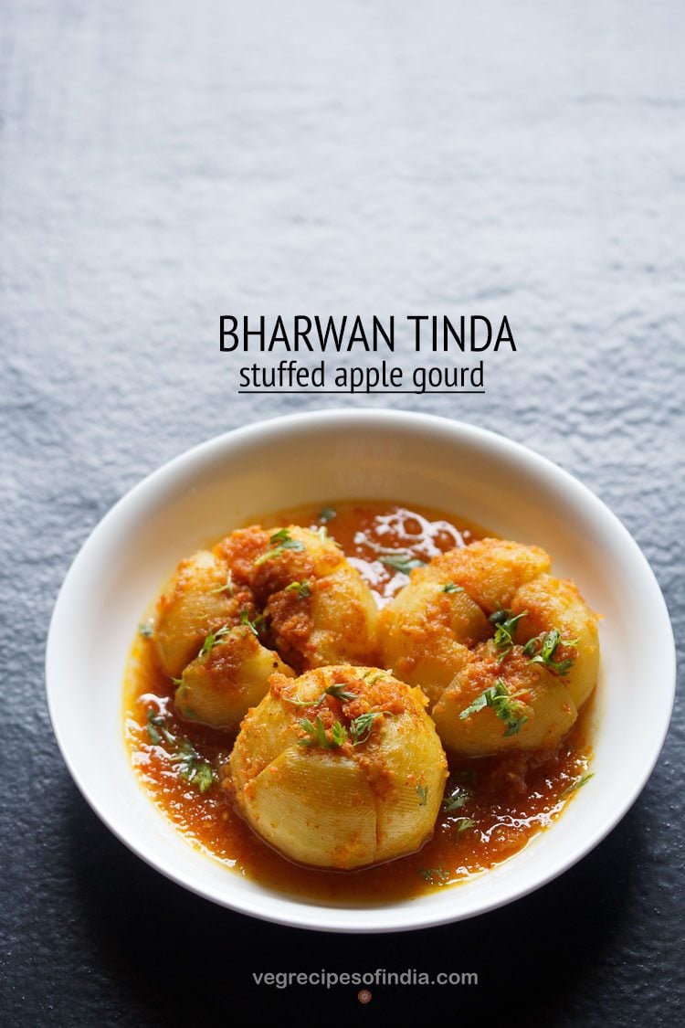 tinda recipe garnished with coriander leaves and served in a white bowl with text layovers.