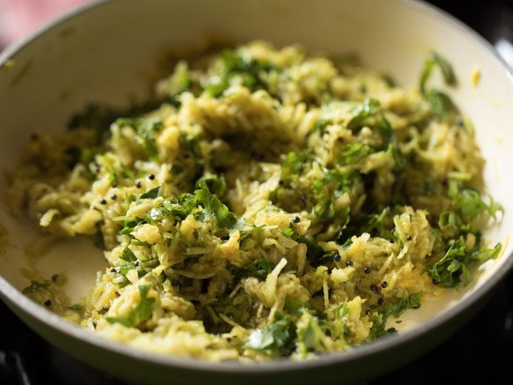 making Gujarati handvo recipe in pan