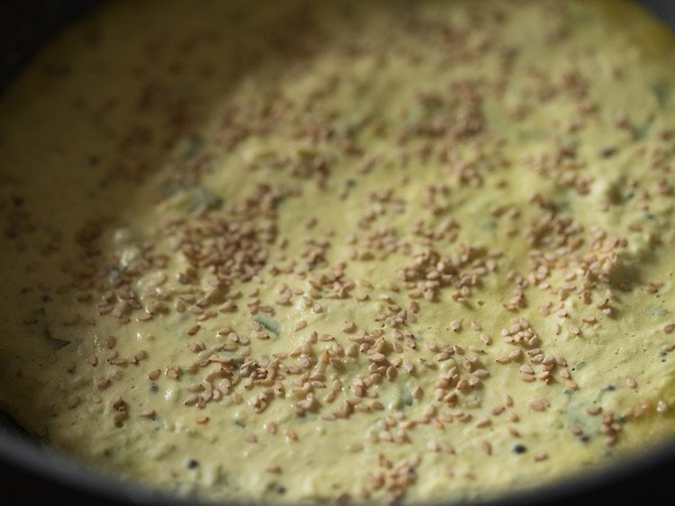 making Gujarati handvo recipe in pan