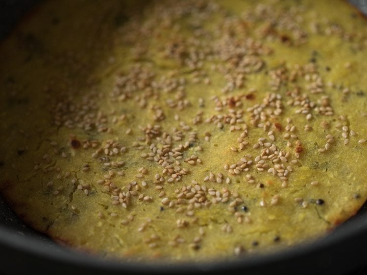 making Gujarati handvo recipe in pan