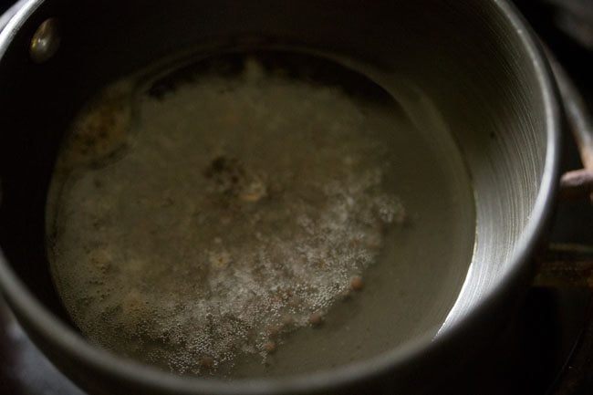 mustard seeds crackling in hot coconut oil. 