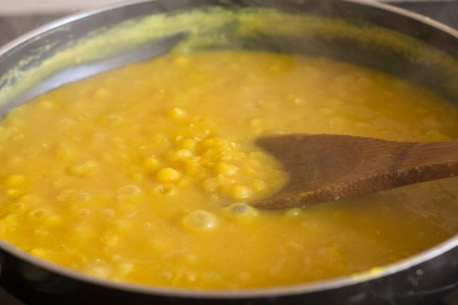 stirring the simmering ragda. 