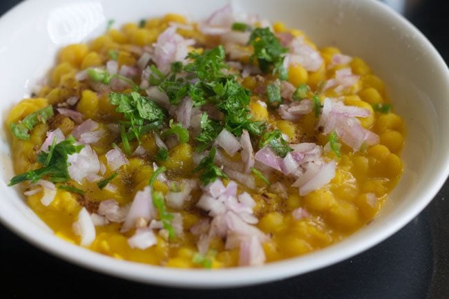 chopped coriander leaves added to ragda. 