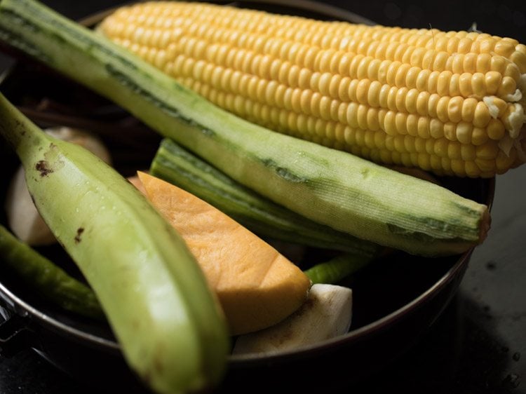 raw banana, yellow pumpkin, ridge gourd, elephant foot yam and corn for rishi panchami bhaji. 