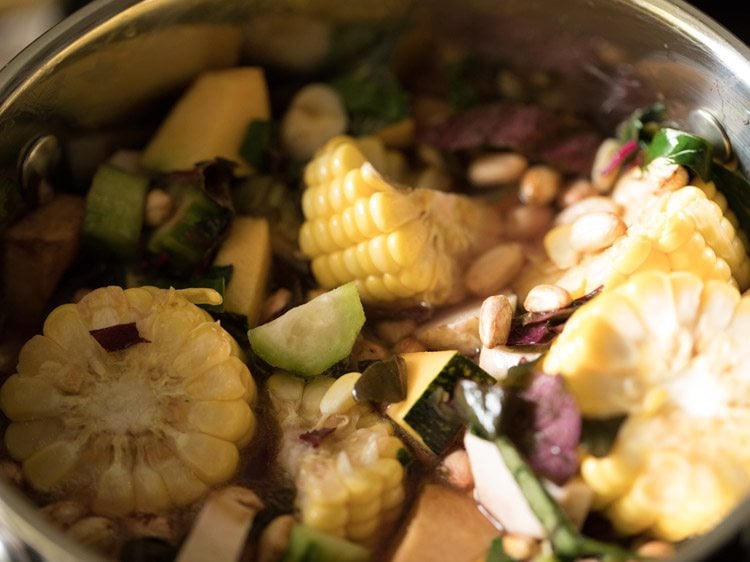 salt mixed well with the vegetables and greens.