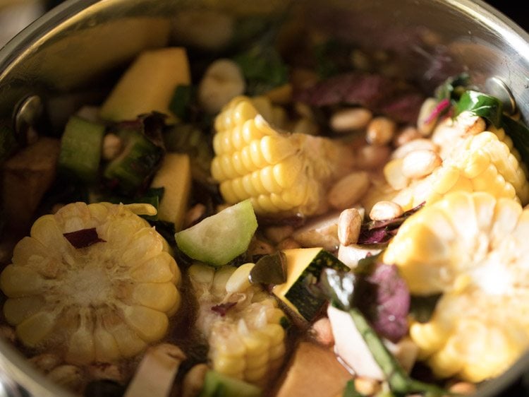 salt mixed well with the vegetables and greens. 