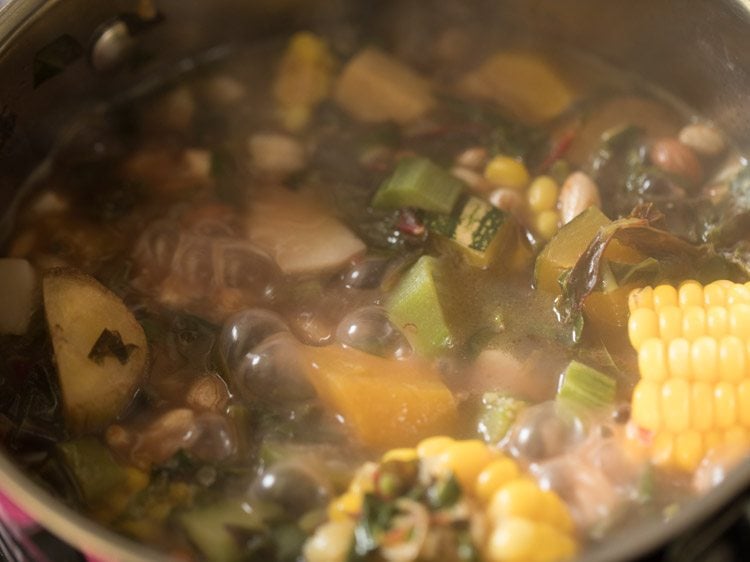 cooking rushichi bhaji.