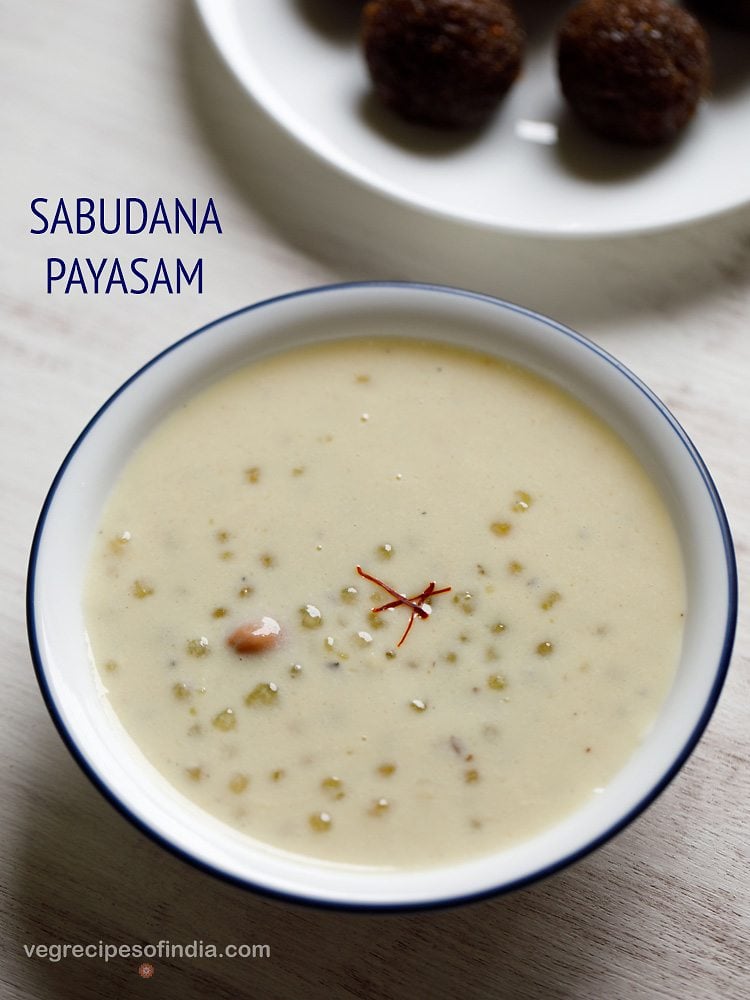 javvarisi payasam served in a blue rimmed white colored bowl with saffron strands in the center.