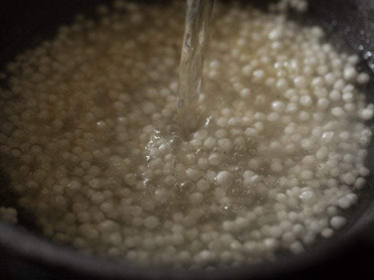 water being poured in the pan. 