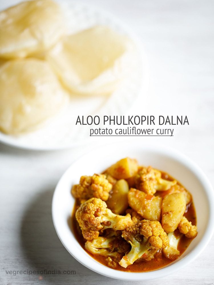 aloo phulkopir dalna served in a white bowl with a plate of luchi kept on the top left side and text layovers.