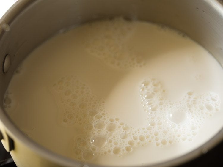 milk added in a large pan. 