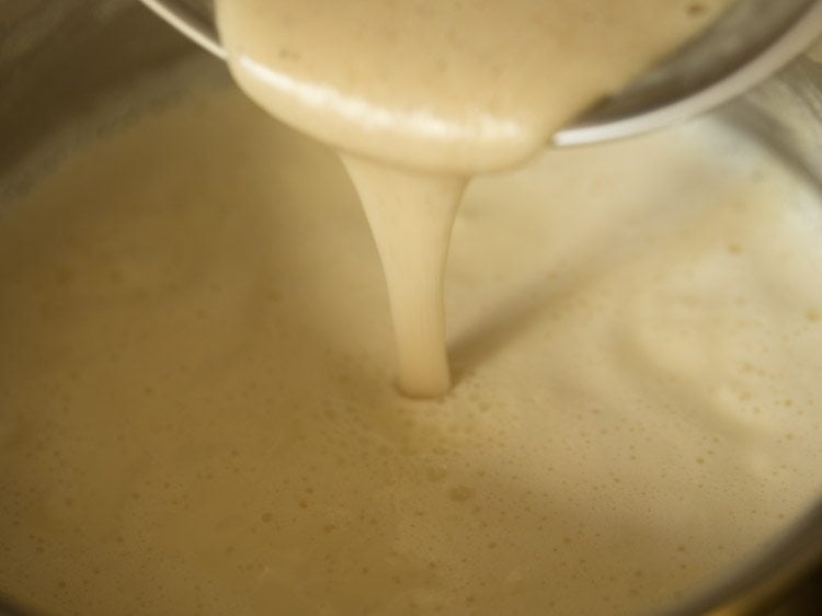 adding prepared almond mixture in the boiling milk.
