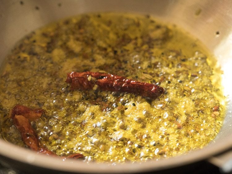 sautéing ginger with the spices. 