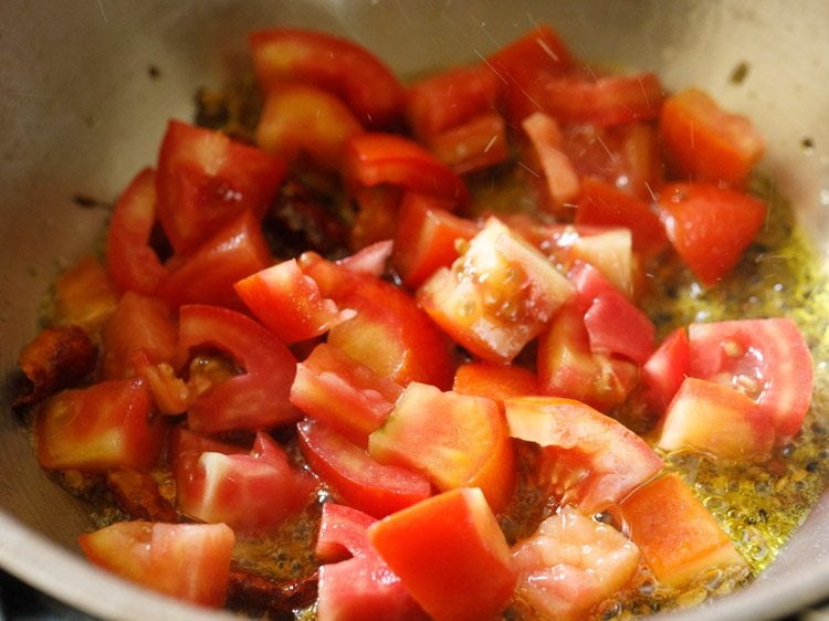 chopped tomatoes added to the oil. 