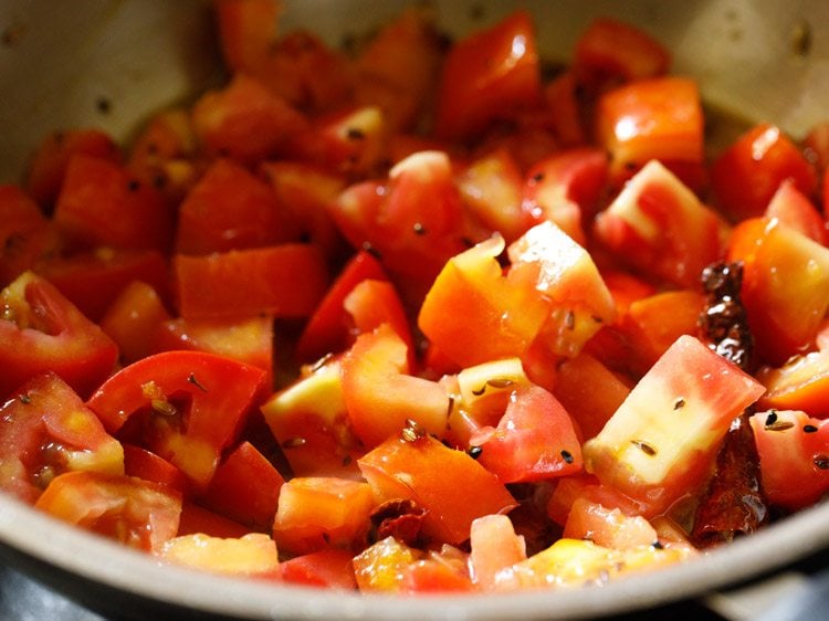 tomatoes mixed with the spices and oil. 