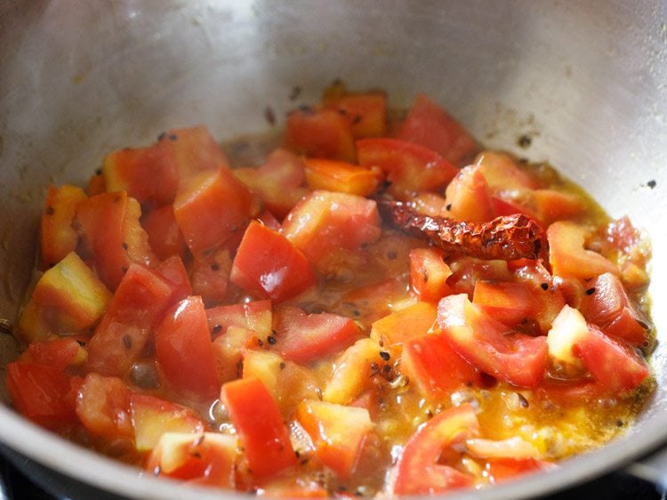 cooking the tomato mixture. 