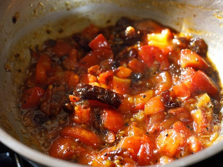 sugar and dried mango powder mixed well with the tomato-date mixture. 