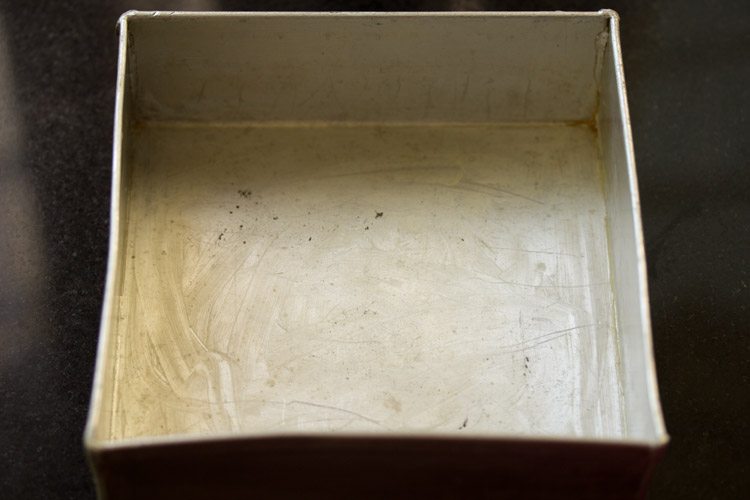 square cake pan rubbed with butter prior to adding batter