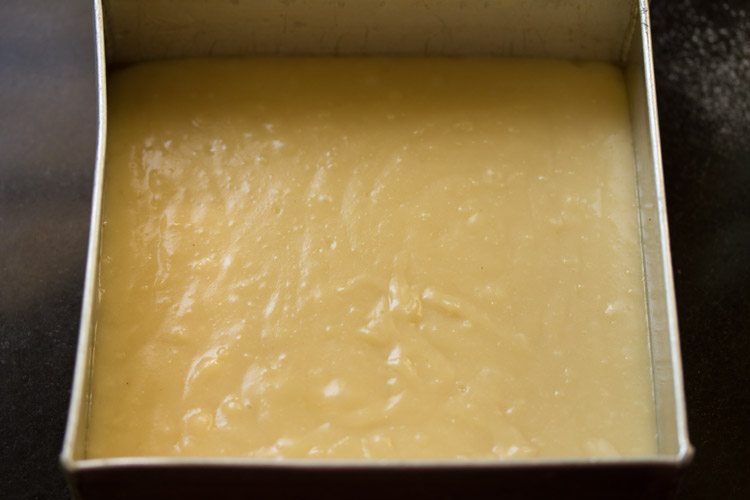 square baking pan of sponge cake batter