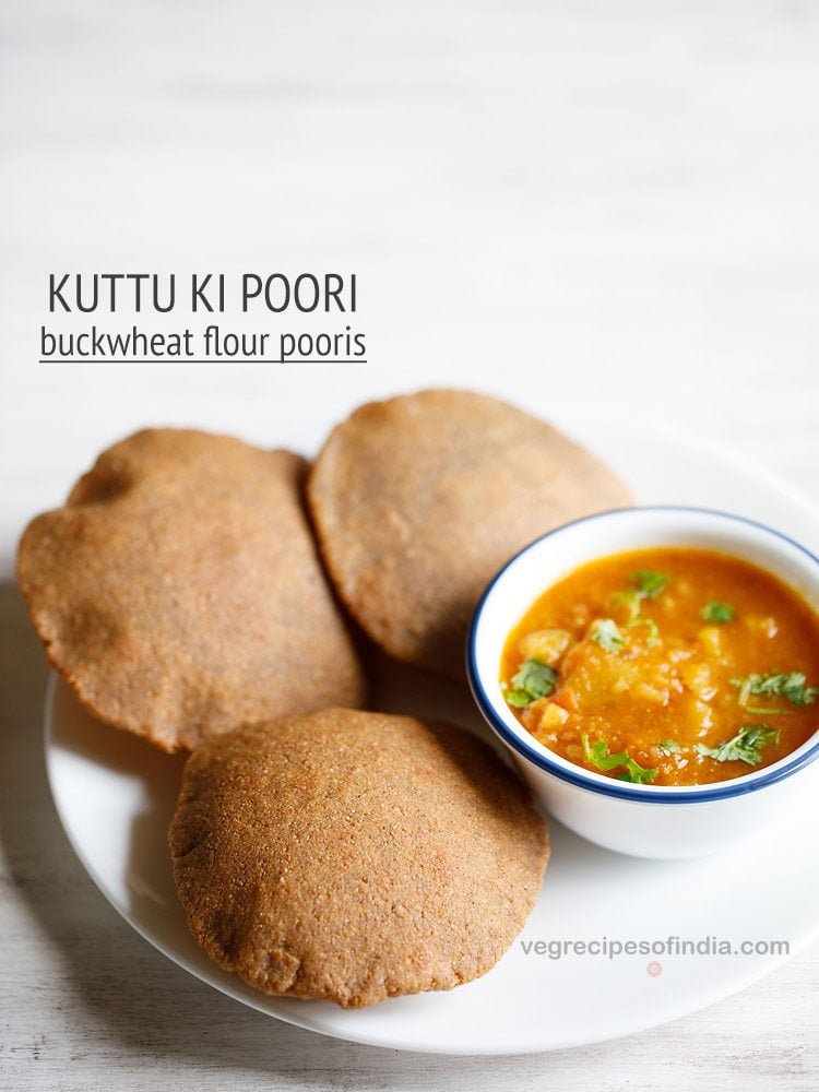 kuttu ki puri served on a white plate with a bowl of vratwale aloo sabzi in a blue rimmed bowl kept on the right side and text layovers.