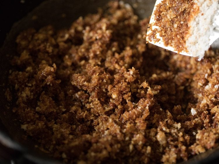 jaggery powder mixed well with the coconut. 