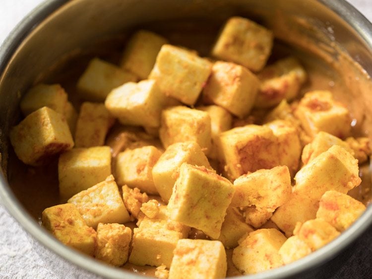 marinated paneer cubes added to batter. 