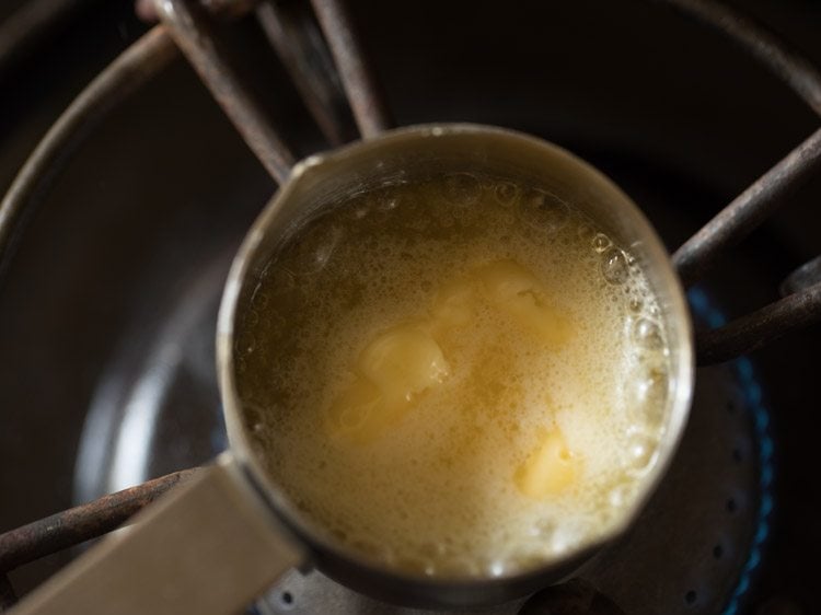 heating the butter till it melts. 