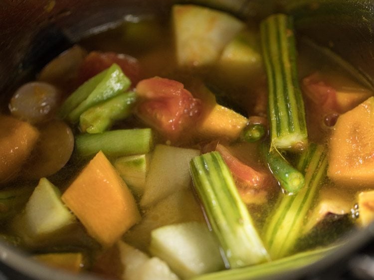 making varutharacha sambar recipe