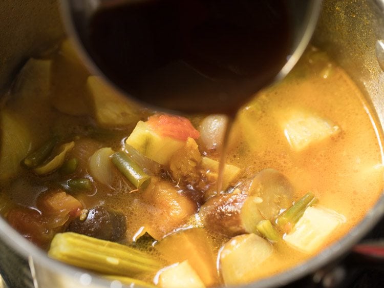 making varutharacha sambar recipe