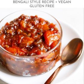 tomato khejur chutney served in a glass bowl kept on a white plate with a spoon on the right side and text layovers.