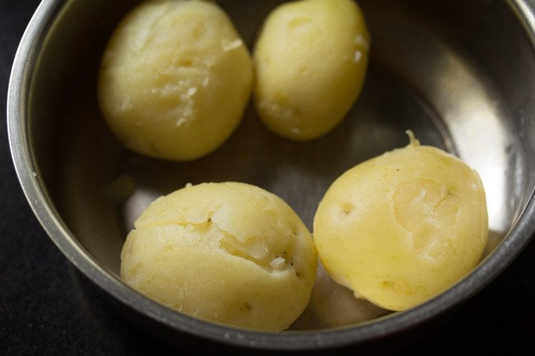 peeled cooked potatoes for making bread patties. 