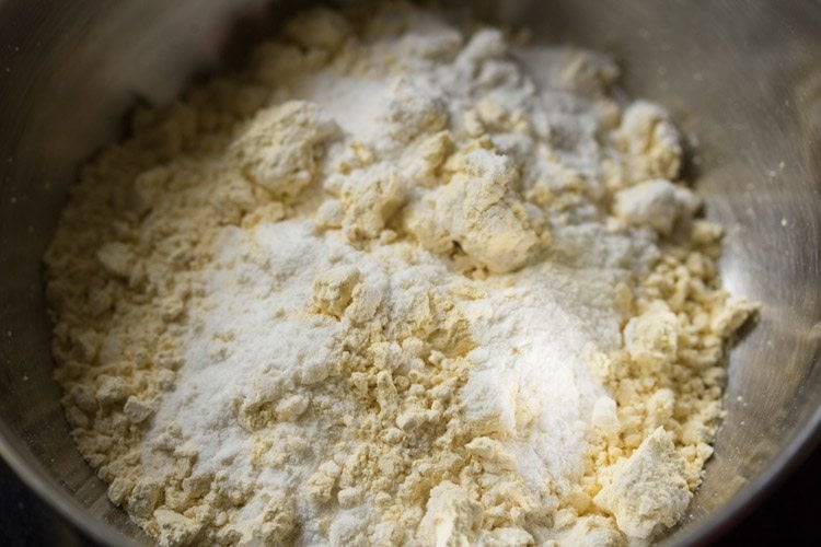 gram flour and rice flour added in another bowl for making batter for bread patties. 