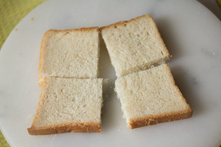 bread sliced into 4 equal parts. 