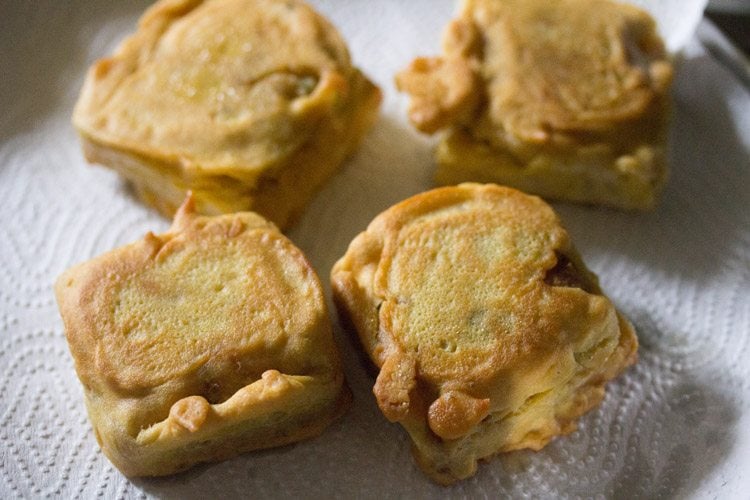 fried potato bread pattice on kitchen paper towels. 