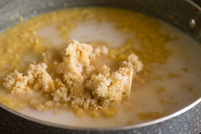 jaggery powder added to the chana dal-coconut milk mixture. 