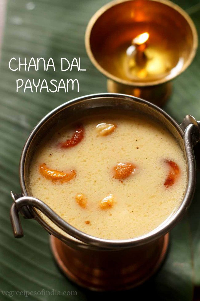 chana dal payasam garnished with fried cashews and served in a fancy bowl with text layover.