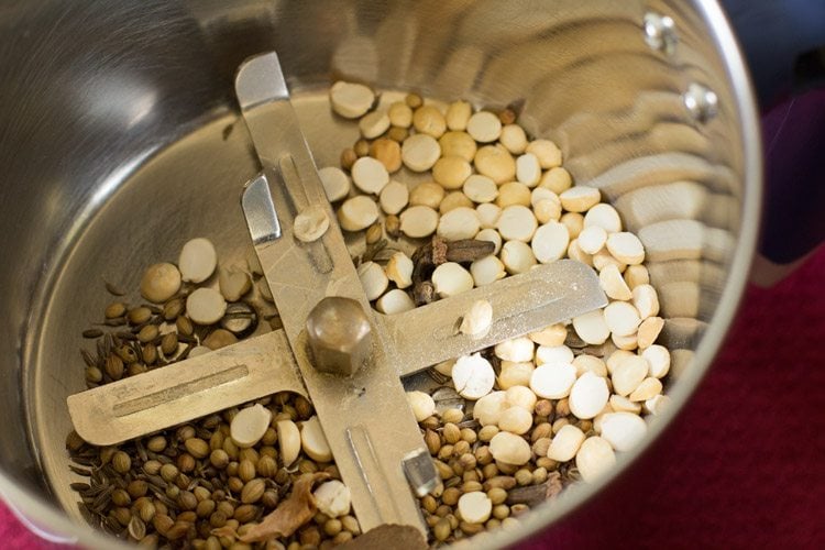 spices and chana dal added to grinder jar