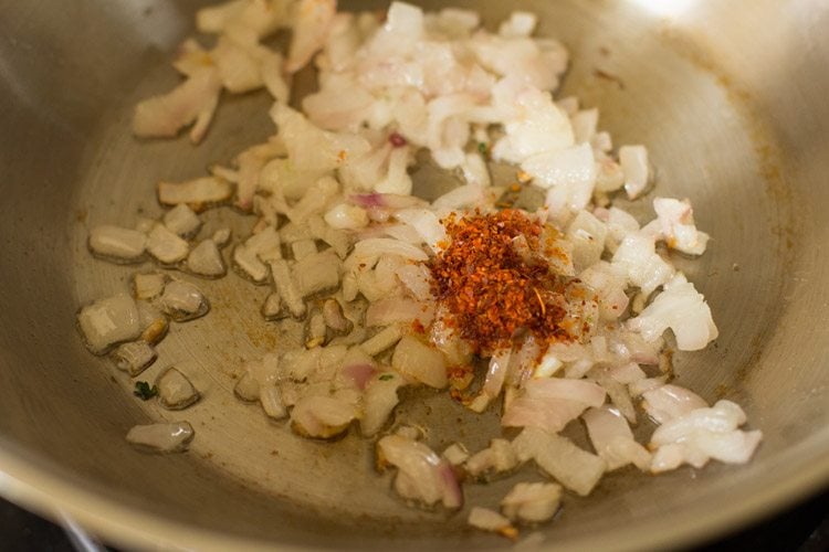 red chilli powder added to onions