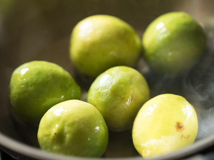 stirring lemons in the  pan. 