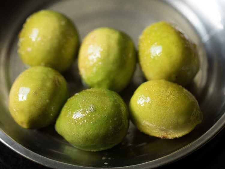 pan fried lemons on a plate. 