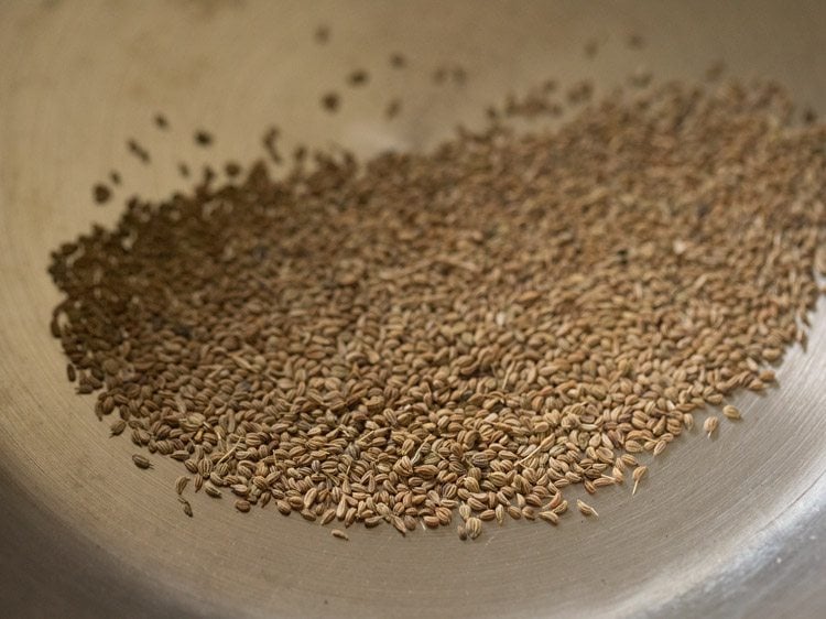 roasting carom seeds till fragrant, 